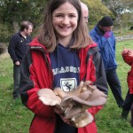 A happy forager with a magnificent oyster mushroom